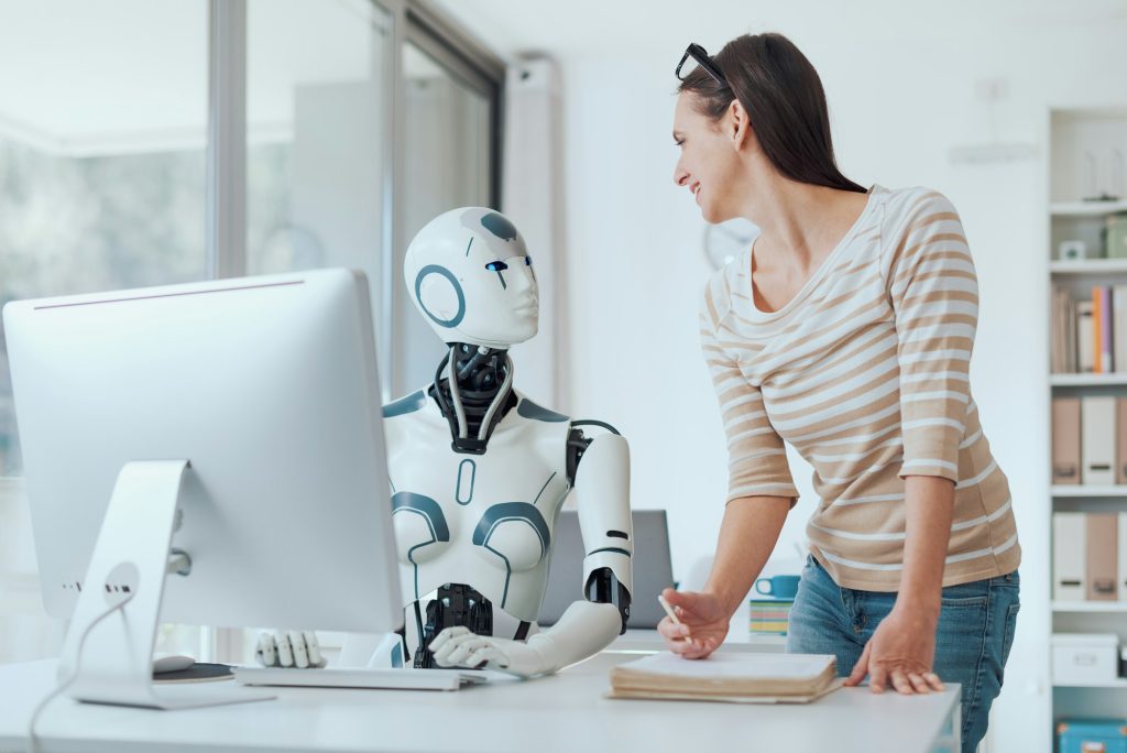 Woman and AI robot working together